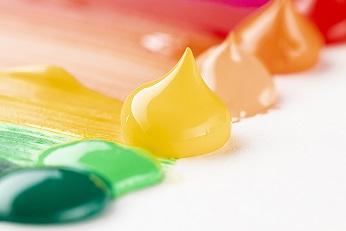 Close up colorful paint white table