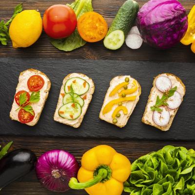 Top view pieces bread with veggies vegetable arrangement
